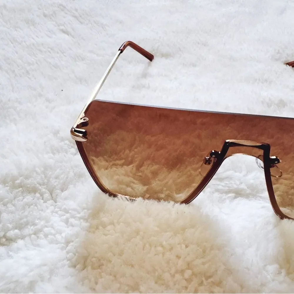 Kalia Clear Brown Rimless Sleek Sunglasses